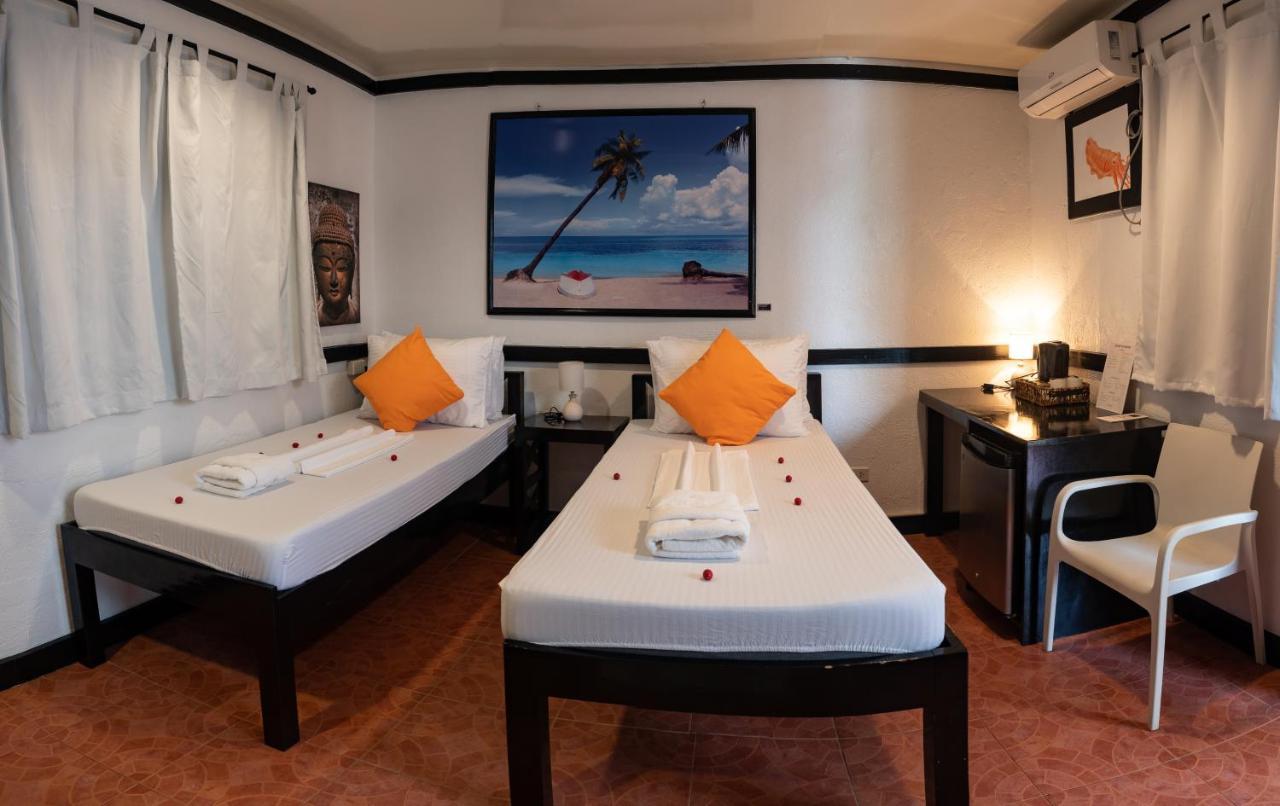 ホテル ヒッポキャンパス ビーチ リゾート マラパスクア島 エクステリア 写真